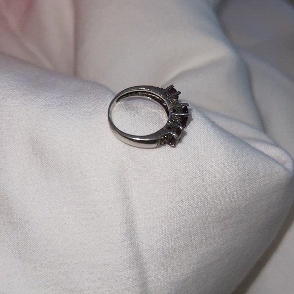 I have a trio of amethysts in this silver ring with marquisate stones - Picture 3 of 6